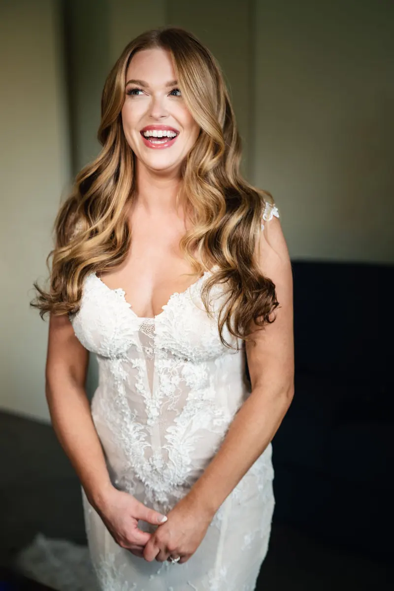 Sara laughing in her wedding dress