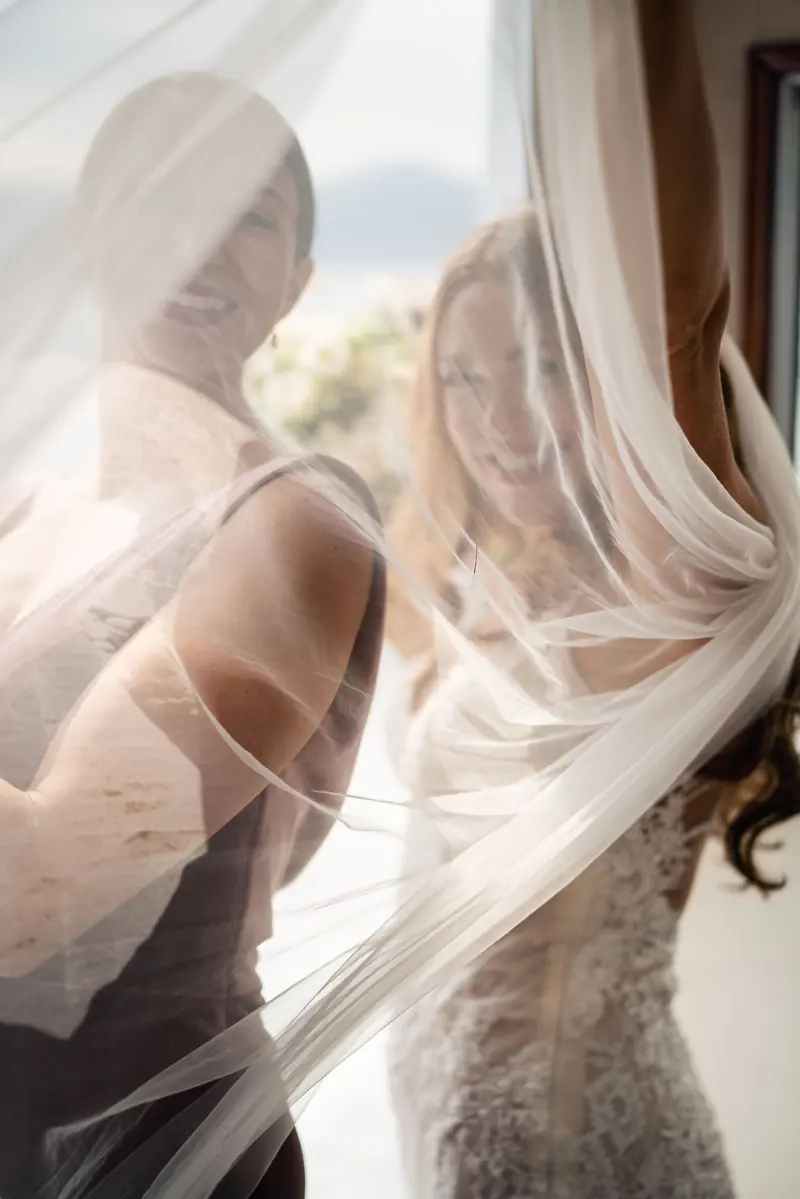 Sara's veil lifting in the wind on the boat