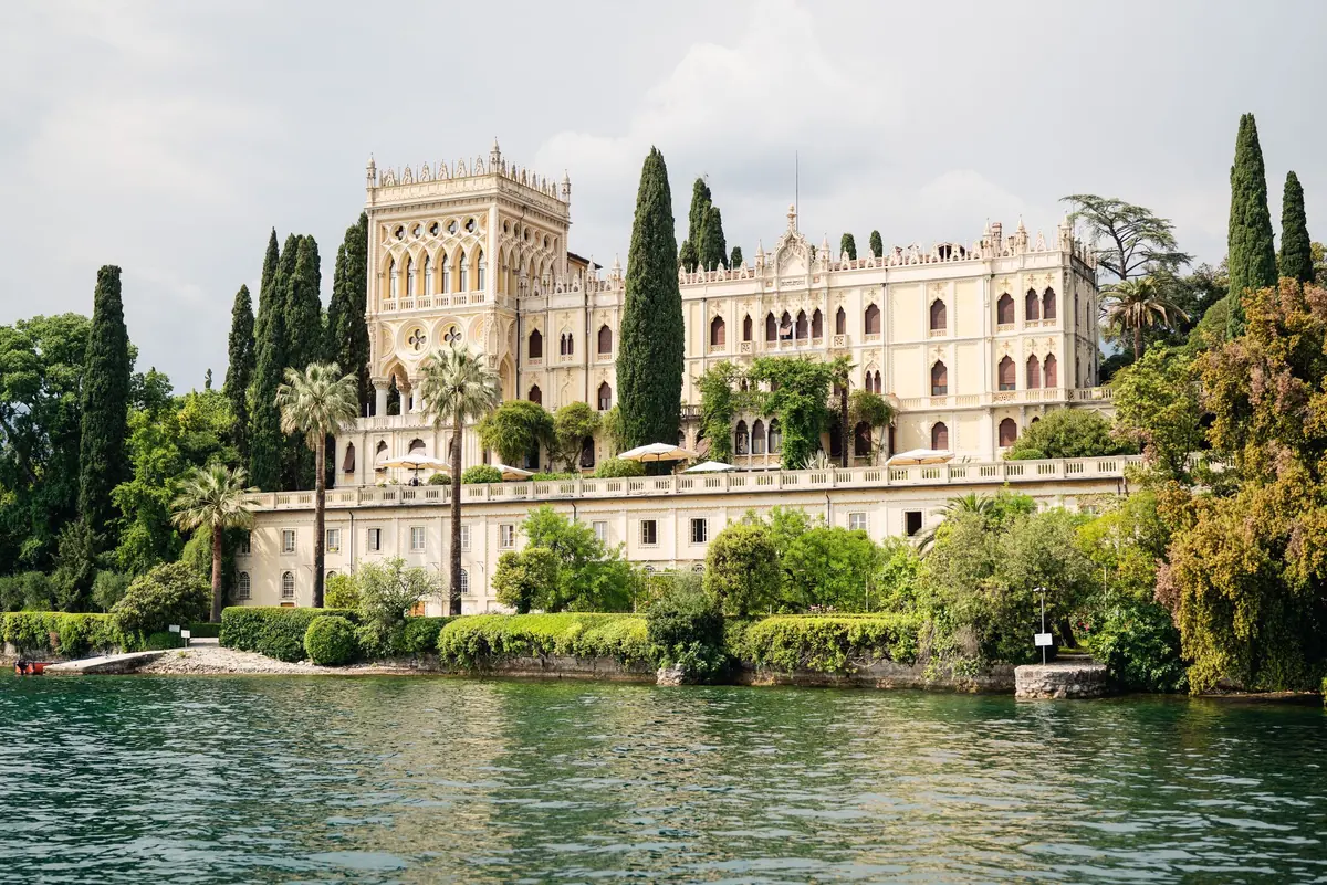 The villa and gardens of Isola del Garda seen from the water