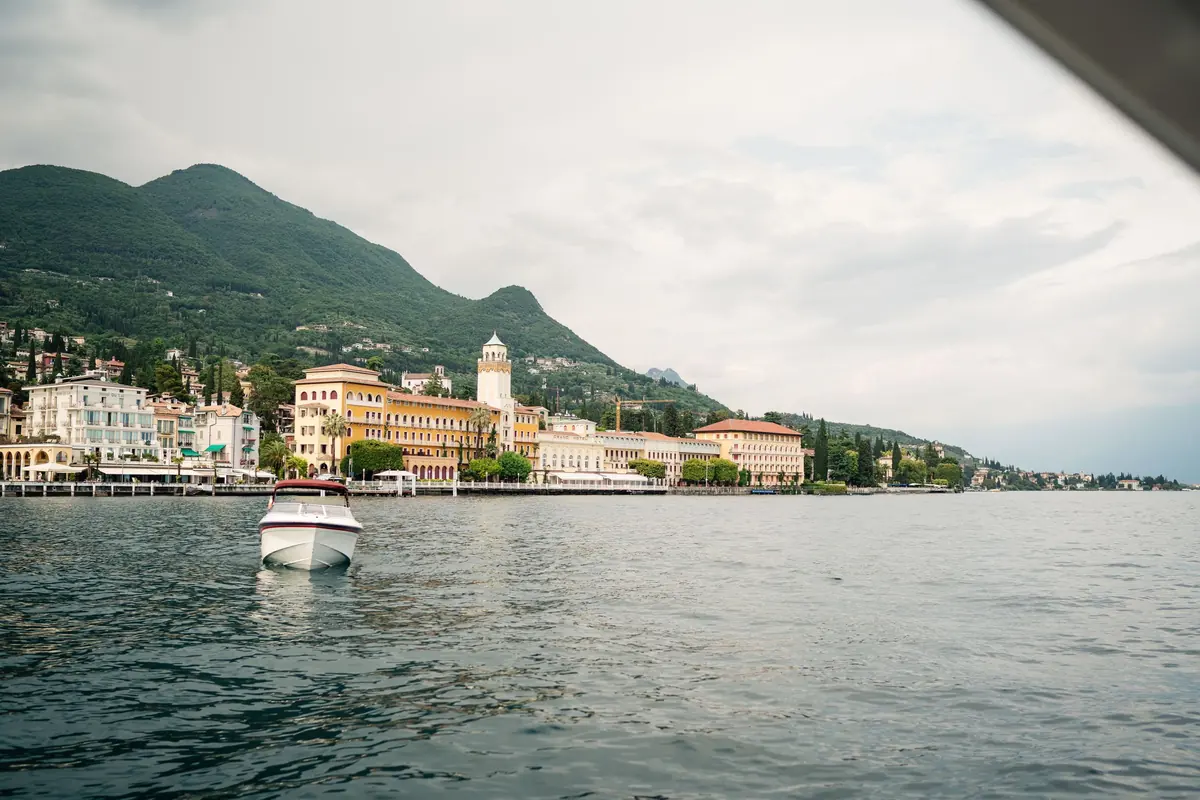 Looking back across Lake Garda to the lakeside town from the boat