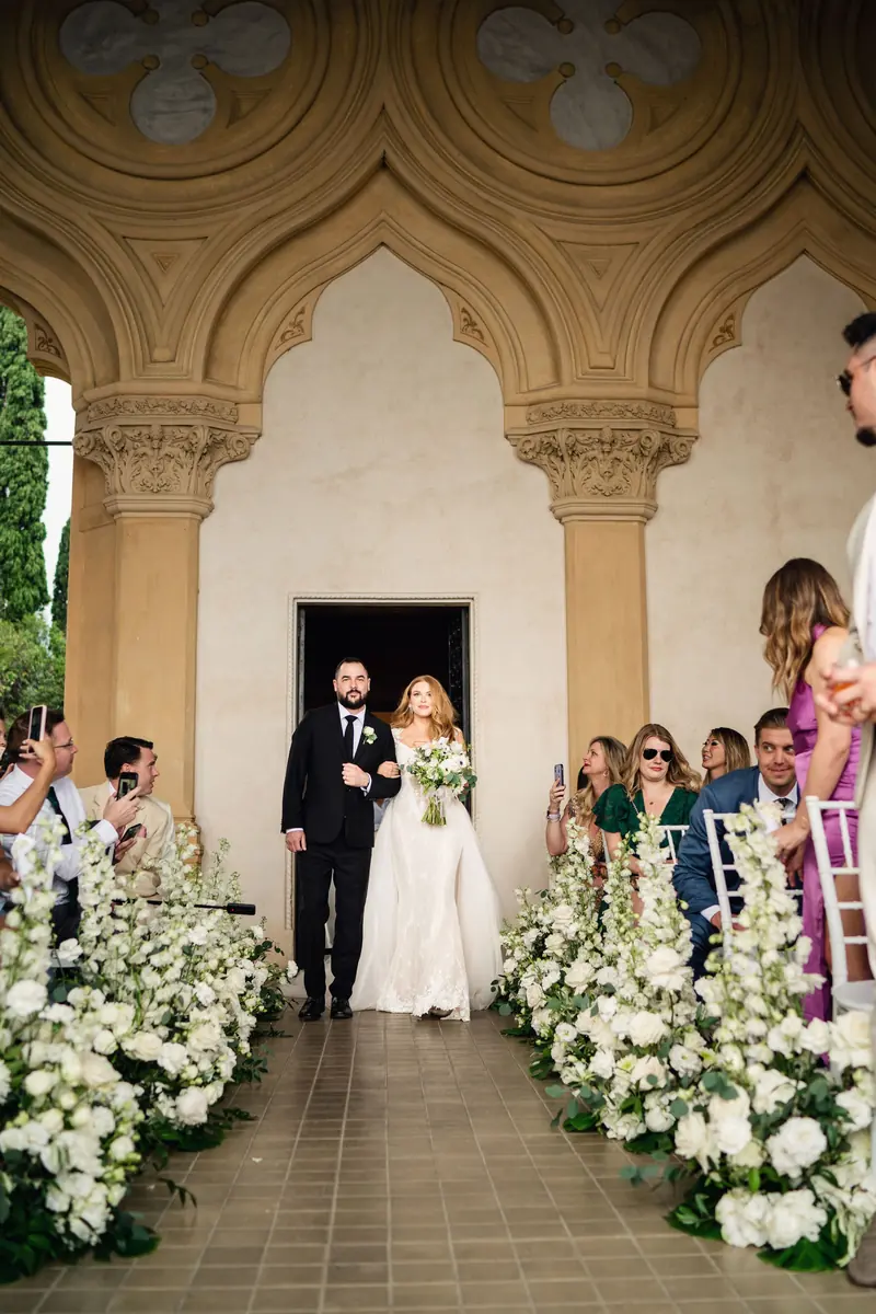 Ceremony aisle under the gothic arches at an Isola del Garda wedding