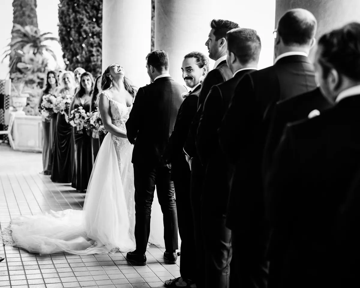 The groomsmen lined up during the ceremony, in black and white
