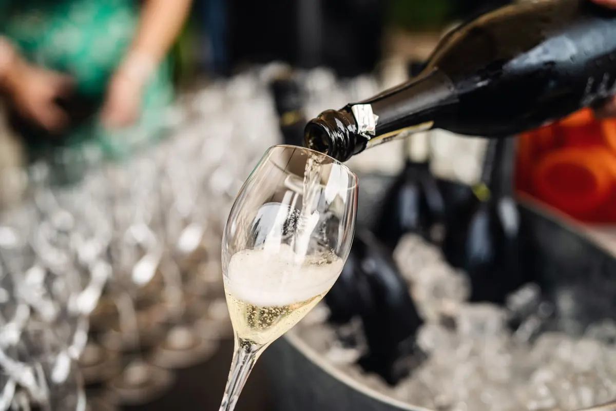 Prosecco being poured at the aperitivo bar