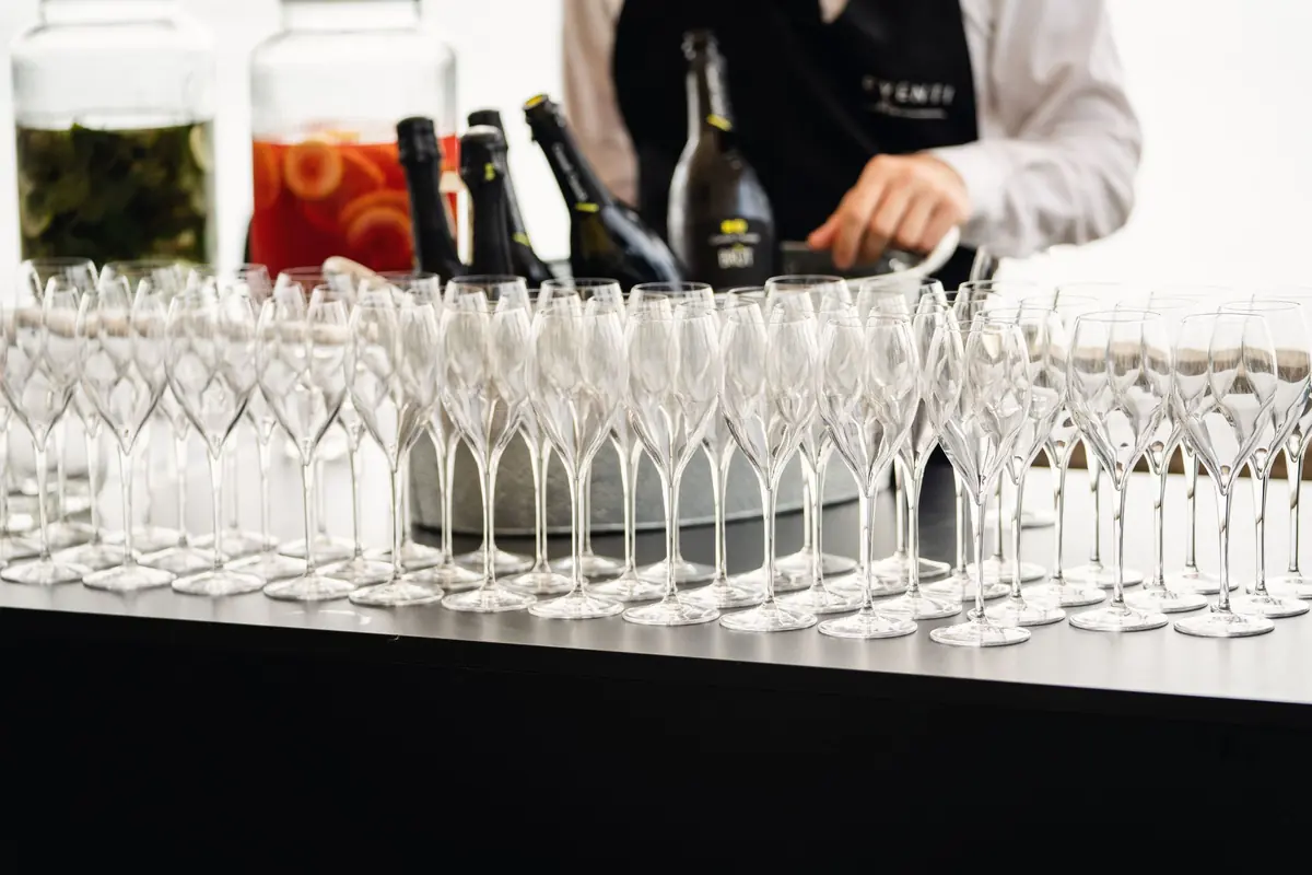 Rows of glasses ready at the aperitivo bar