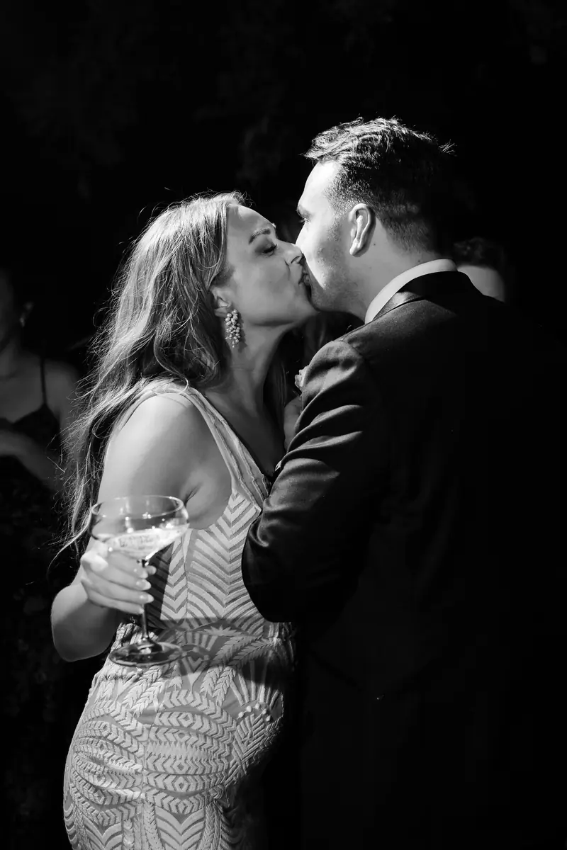 Black and white photo of the couple dancing close
