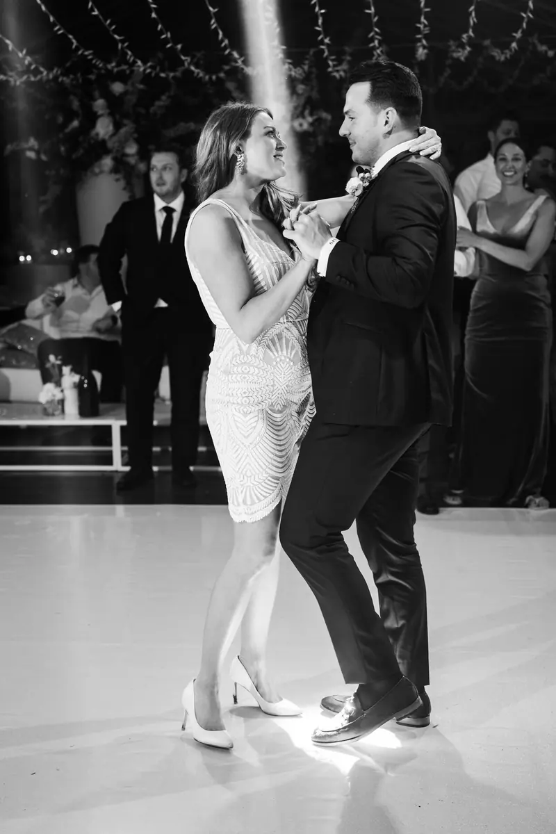 Black and white photo of the couple's first dance
