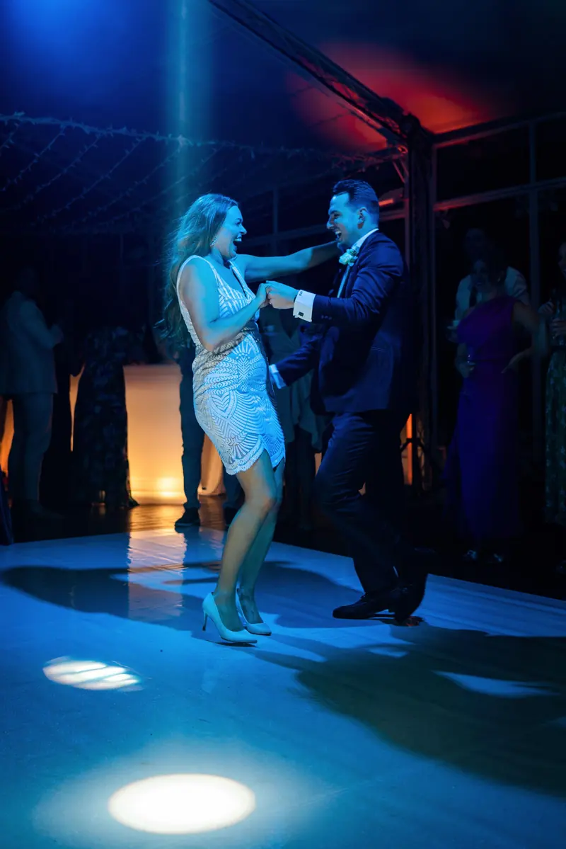Sara and Drew's first dance in blue light