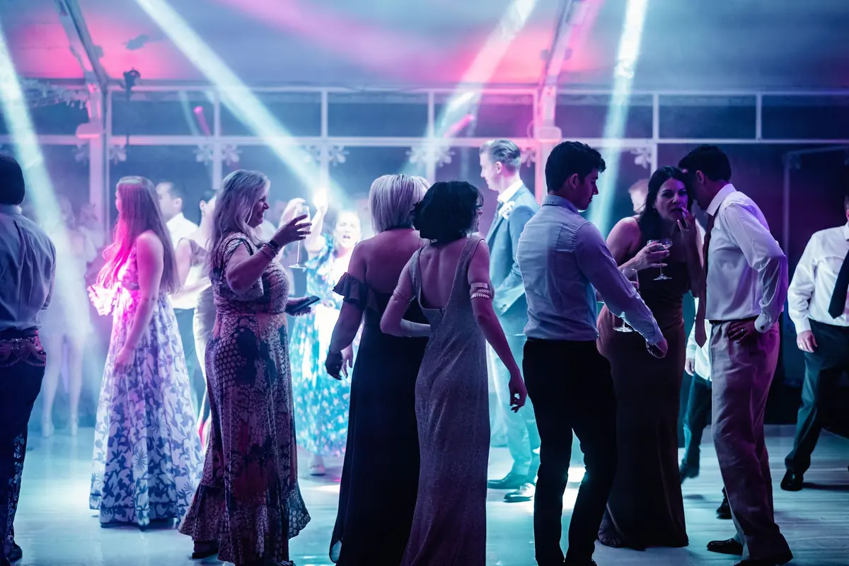 A full dance floor under the marquee lights